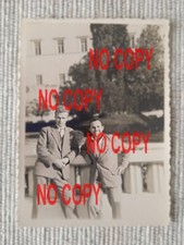 1957 two greek men smart - greek,