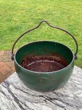 A Kenrick and Sons cast iron swing handled ('Gypsy') cooking pot