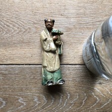 Chinese Figure  Carrying A Jar