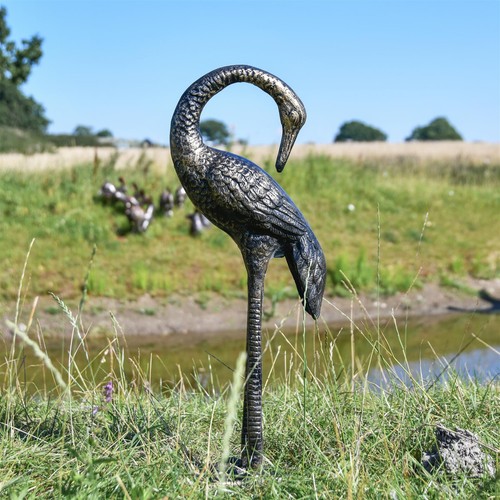 Miniature heron facing - heron,