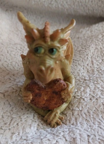 Cookie eating figurine belongs - cookie,