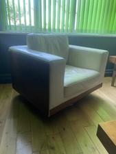 Dwell Lounge swivel chair With Chrome Base