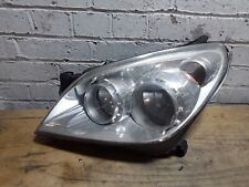 Vauxhall Astra H 2007 Passenger Left Halogen Headlight Chrome Background.