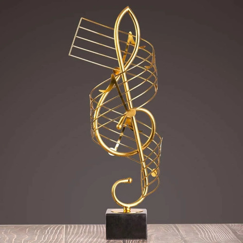 Gold musical note sculpture - musical,