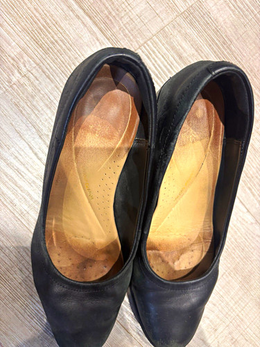 Very worn cabin crew heels - worn,