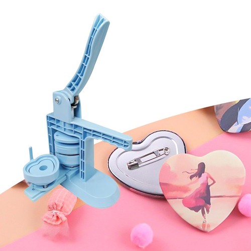 Button making machine - making, heart