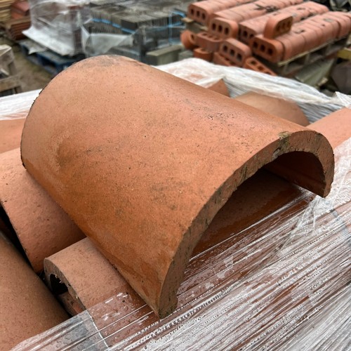 New orange half round clay - half,