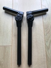 Two Simmons tom tom arms