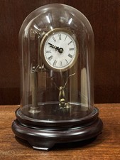 Skeleton Clock In Case With swinging Monkey Pendulum