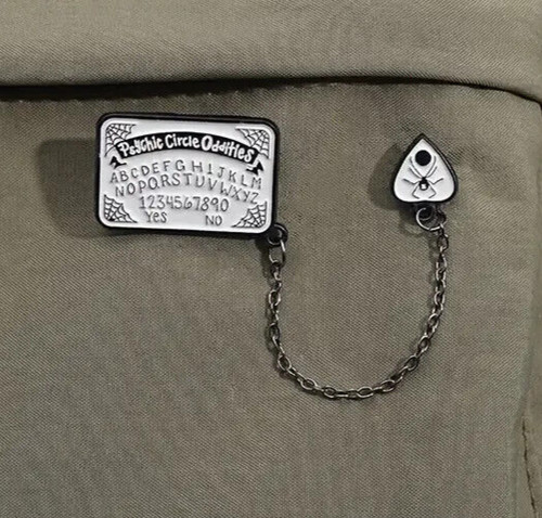 Ouija board pointer pin - ouija,