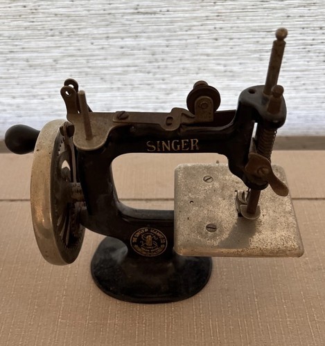 Early antique singer - antique,