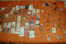 330 pairs of earrings and 35