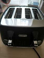 Delonghi Distinta X 4 Slice Toaster Black – Stainless Steel, Defrost & Reheat