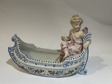Antique Porcelain Figure Of An Angel In A Boat