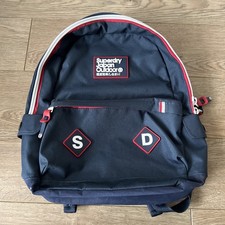 Super Dry Japan outdoor Back Pack Navy Blue with red and white graphics 