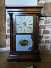 Antique Waterbury twin weight clock .  