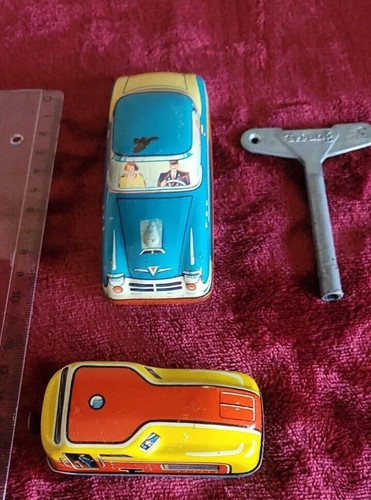 Pair tri ang tin toys - a, tri-ang