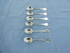 AN ANTIQUE STERLING SILVER SET