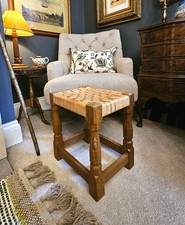 VINTAGE ROBERT MOUSEMAN THOMPSON LEATHER STRAP TOP STOOL WITH SIGNATURE MOUSE