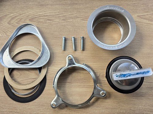 Used insinkerator flange - used,