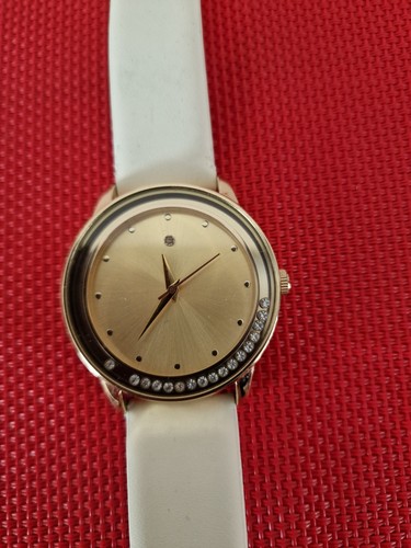 Avon round face watch - face,