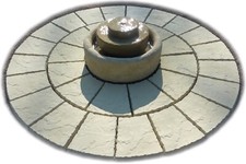 Millstone water feature - millstone,