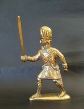 Highlander. 18cm tall. Weighs over 900g. Brass figure