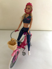 vintage Barbie with helmet on Bicycle with dog in basket( Blue legs Rarer ) good