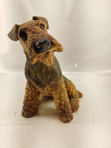 1985 vintage airedale sitting - vintage,