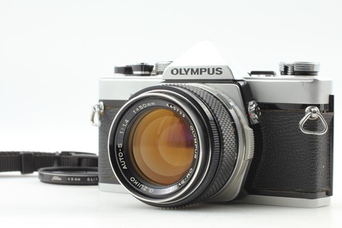 Exc olympus om 1 - ],