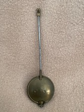 ANTIQUE BRASS AND STEEL CLOCK