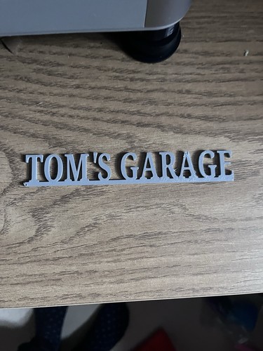 Tom garage sign toy - tom’s,