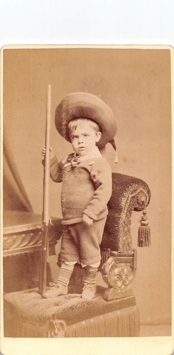 Young boy holding toy - boy,