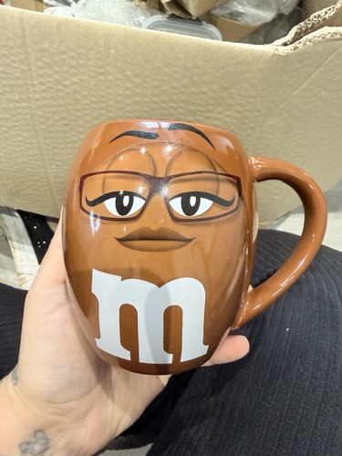 Brown character mug cup - m&m,