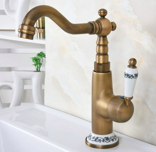 Antique brass swivel spout - antique,
