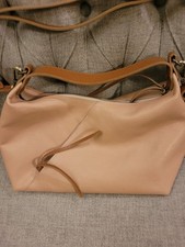 Sundance pink and tan leather