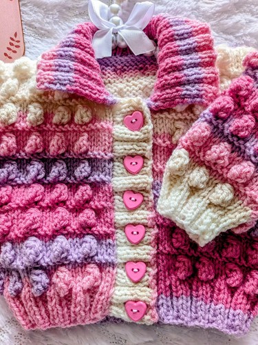 Hand knitted pink multi - hand,