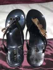 BNWT Ted Baker Flip Flops, Colour Black and Gold 100% Genuine. Size 5