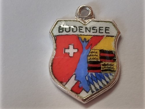 Silver travel shield - , charm