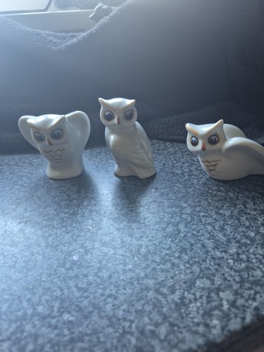 Porcelain owl firgurines - ,