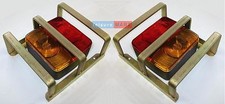 A Pair of Square Four Function Trailer Lights with Heavy Duty Lamp Guards