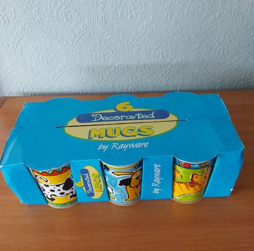 Set ceramic mugs by - of,