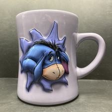 Disney Store Eeyore Bursting Through a Wall LARGE Purple Embossed Ceramic Mug