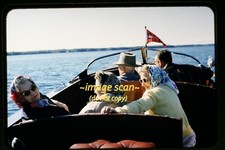 Women on Chris Craft Motorboat