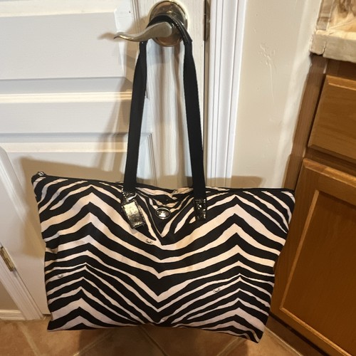 Coach black white zebra - &,