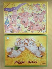 2 NEW BOXED SEALED PIGGIN