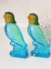 Vintage Avon parrot bottles in