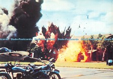 D072533 A Petrol Bowser Receives a Direct Hit During a Bombing Attack on One of
