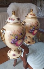 2No aynsley orchard gold urns both signed by D Jones