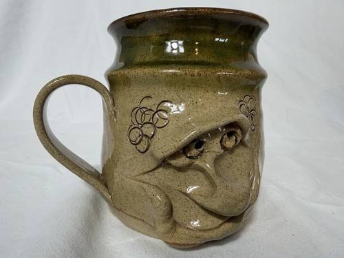 Pretty ugly pottery mug - pottery,